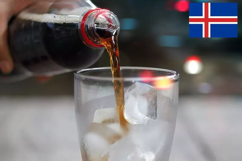 Coca Cola being served in glass