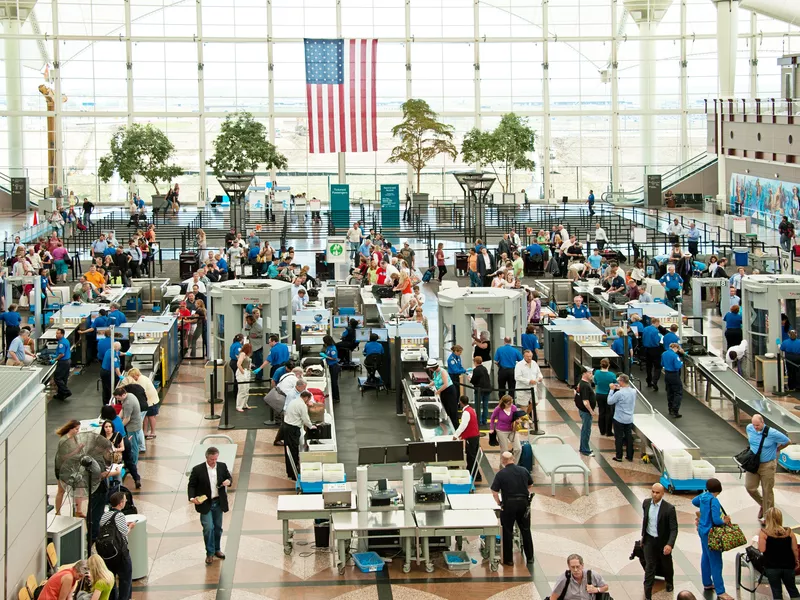 Travelers at Denver International Airport