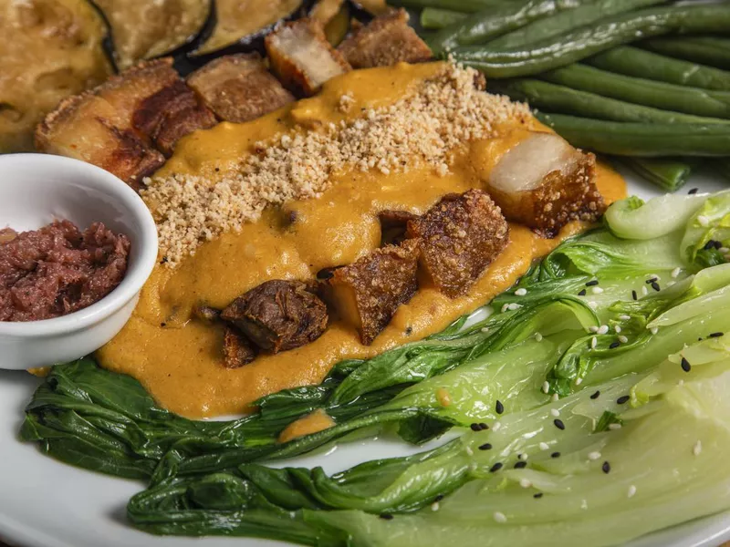 Pork belly kare-kare with vegetables