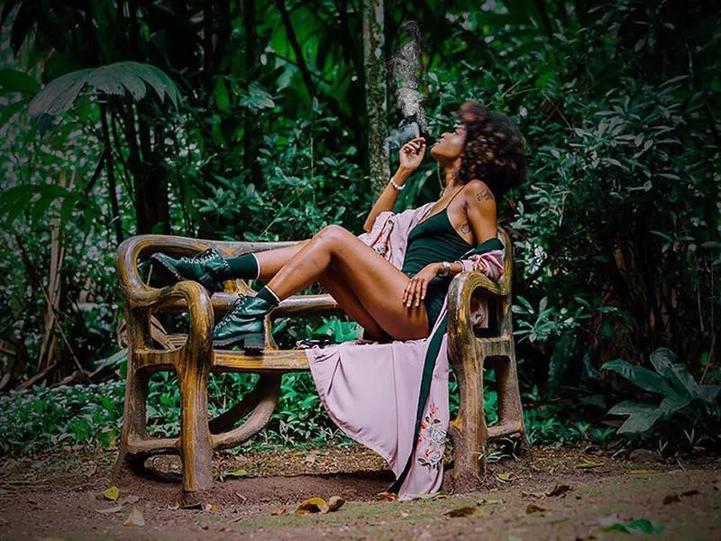 Woman posing for Epican Jamaica dispensary