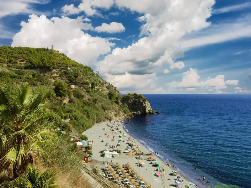 people sunbathing on Maro beach