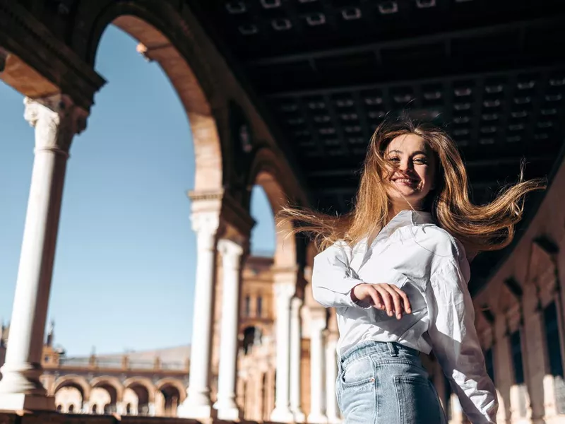 Happy tourist in Seville, Spain