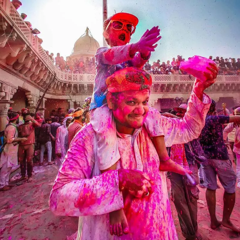 Father and son celebrating Holi