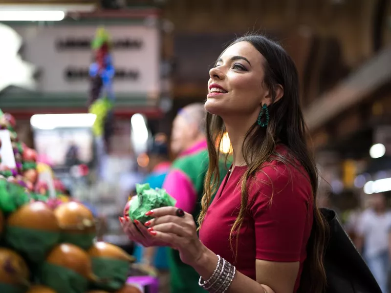 Young woman shopping on the local market