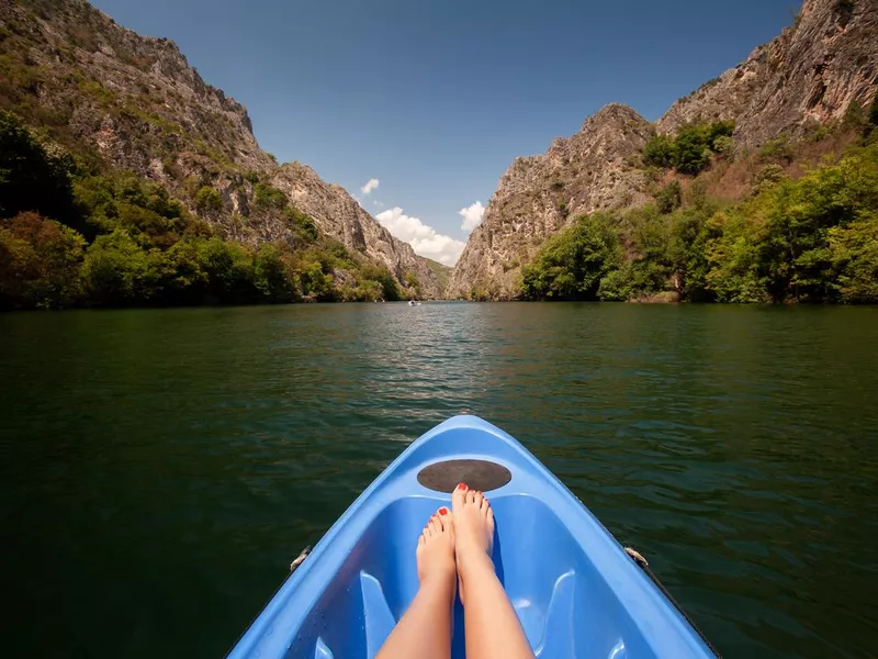 Kayaking through river in Matka canyon, Macedonia