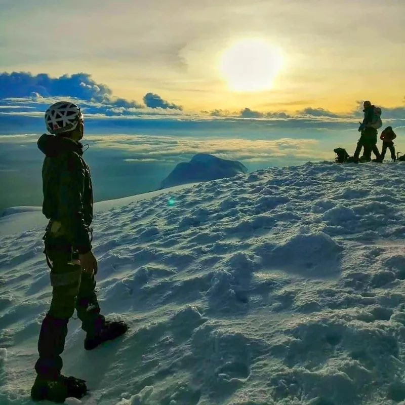 People standing on Mt. Cayambe