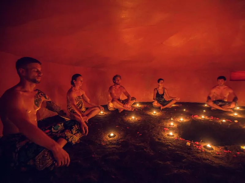 Group of people inside Mayan Temazcal