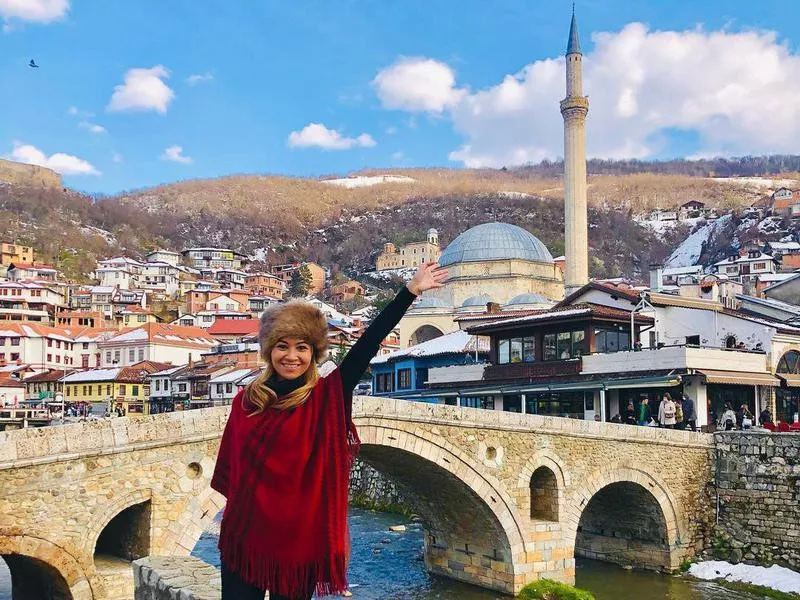 Woman smiling in Kosovo