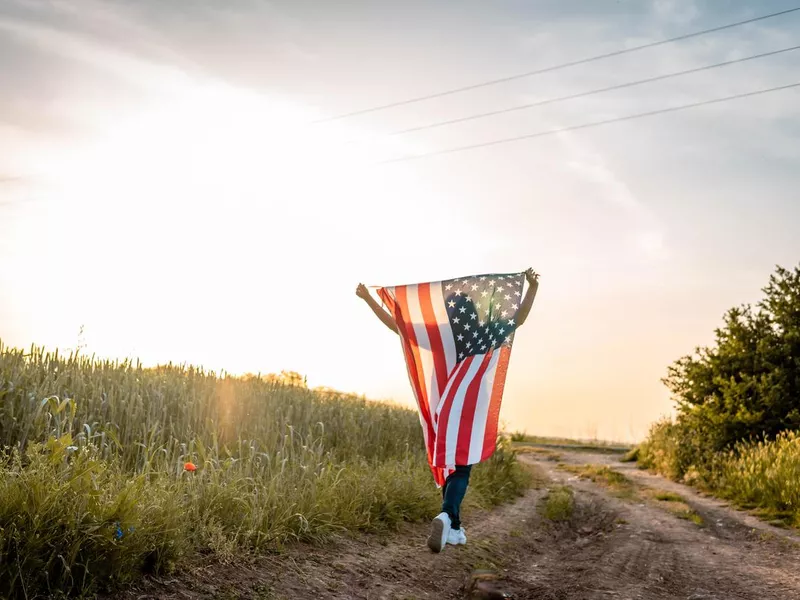 Woman holding flag