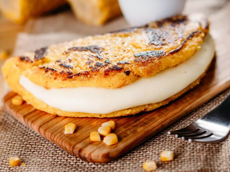 Cachapa with cheese, typical Venezuelan dish made with corn, cheese and butter