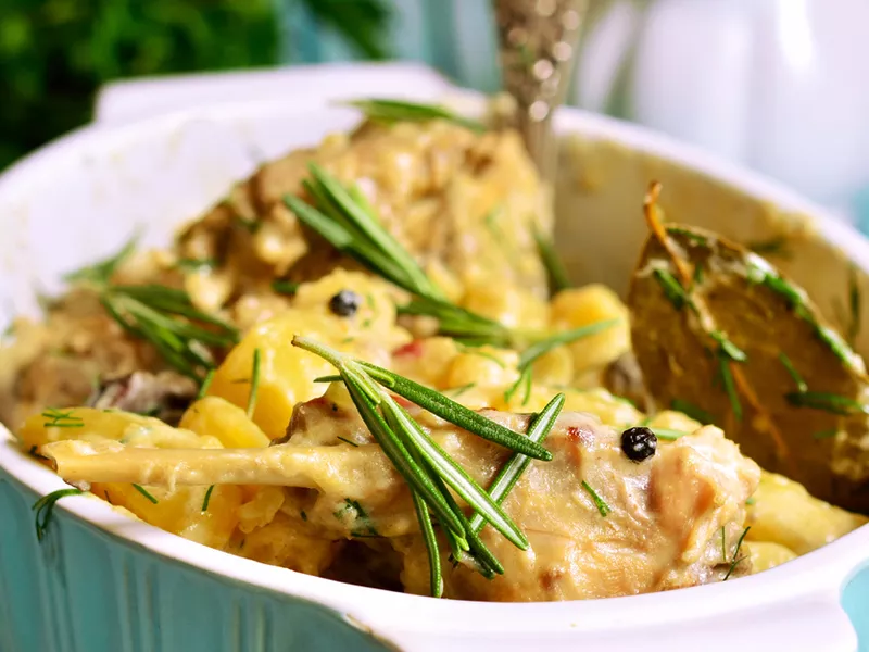 Rabbit stewed with potato in a cream sauce.