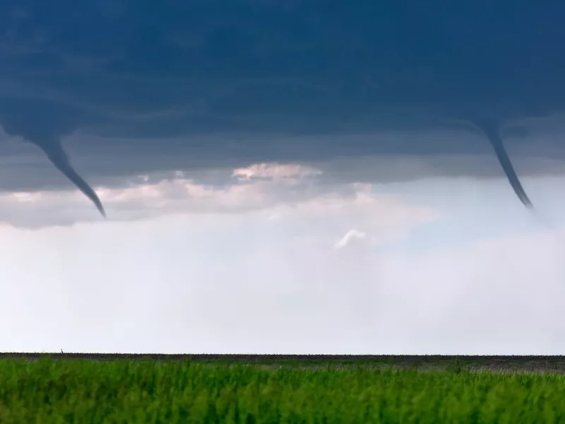 Twin funnels clouds from a pair of landspout tornadoes